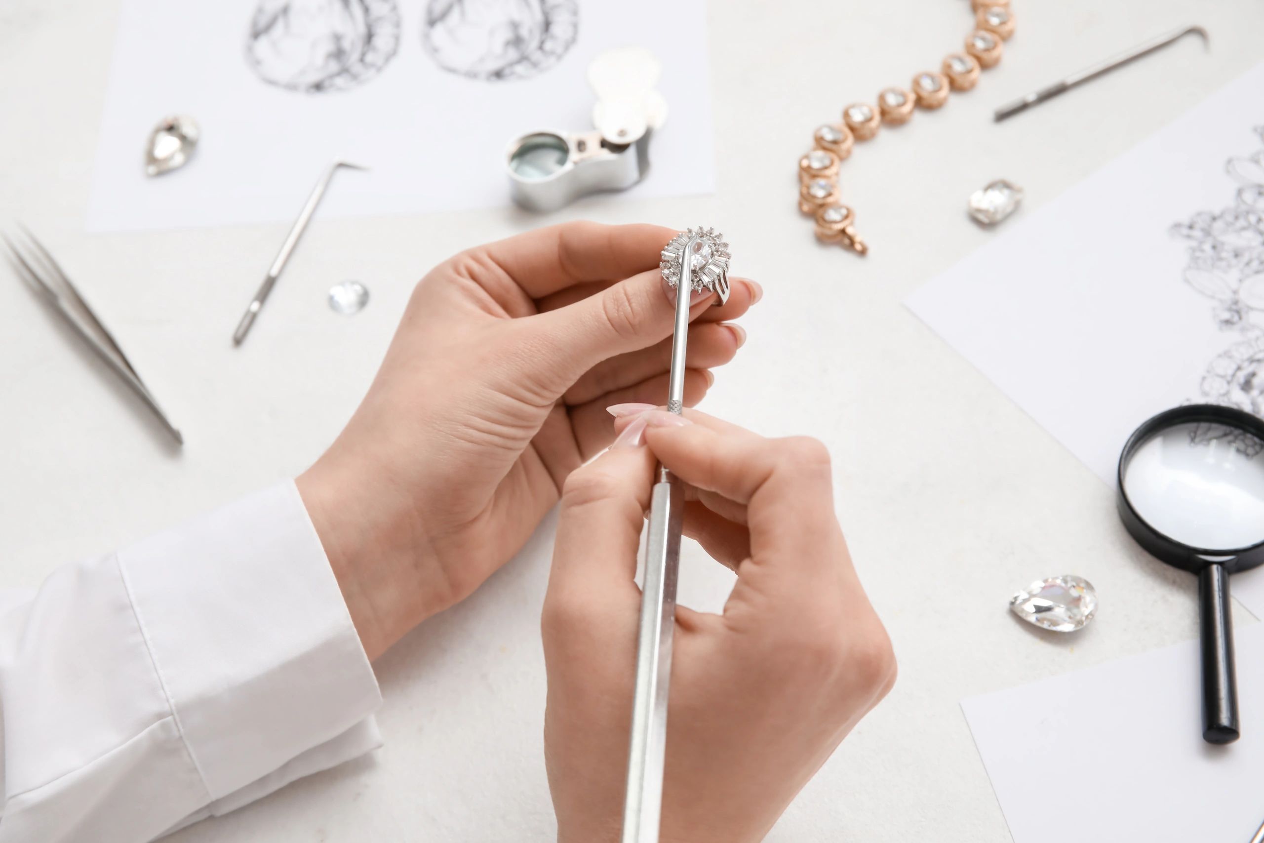 Expert jeweler examining a gemstone under magnification